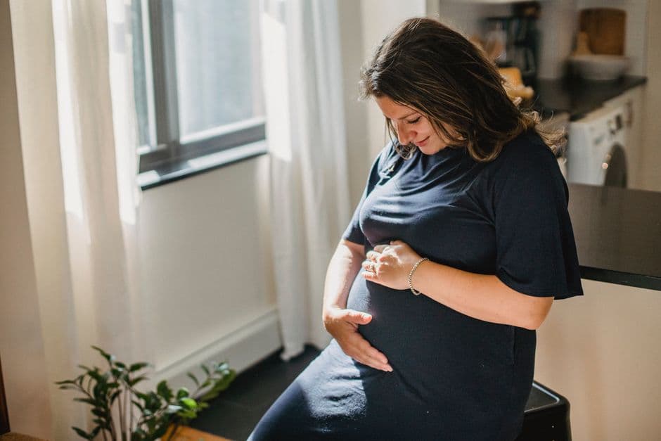 An expecting mother in a peaceful moment